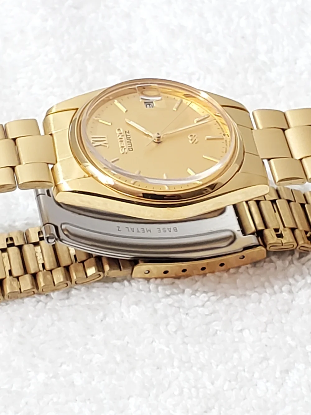 Seiko SQ Vintage Men's Gold Tone Date Quartz Watch Roman Numeral One Jewel